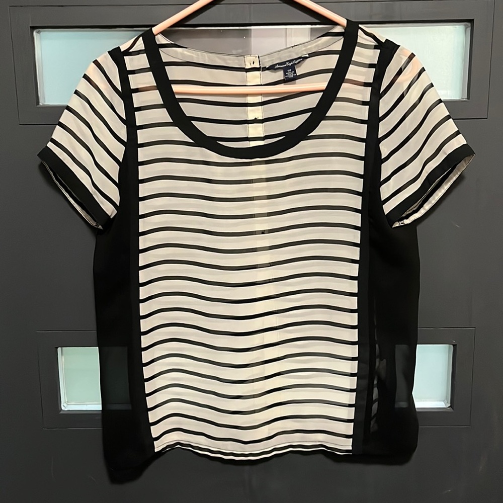 Sheer American Eagle black and white blouse.